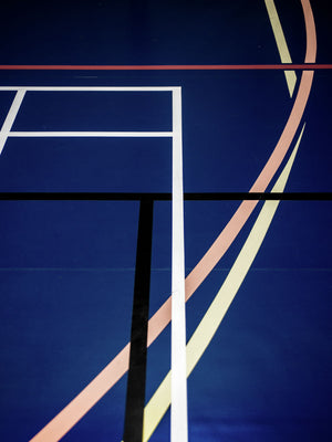 Blue sports hall print with white, pink, and black lines